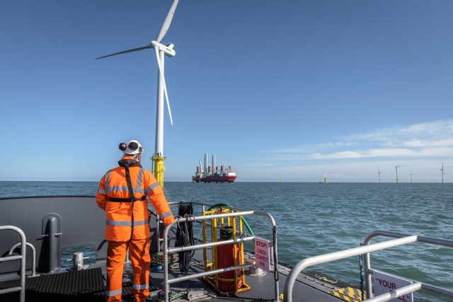 Crew member on deck of boat on offshore wind farm STR subsea equipment