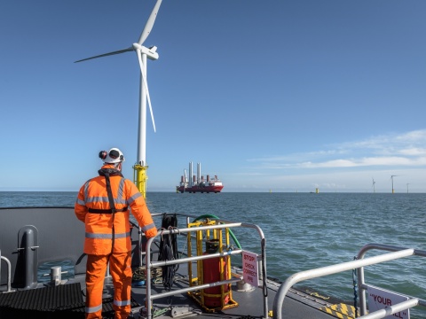 Crew member on deck of boat on offshore wind farm STR subsea equipment